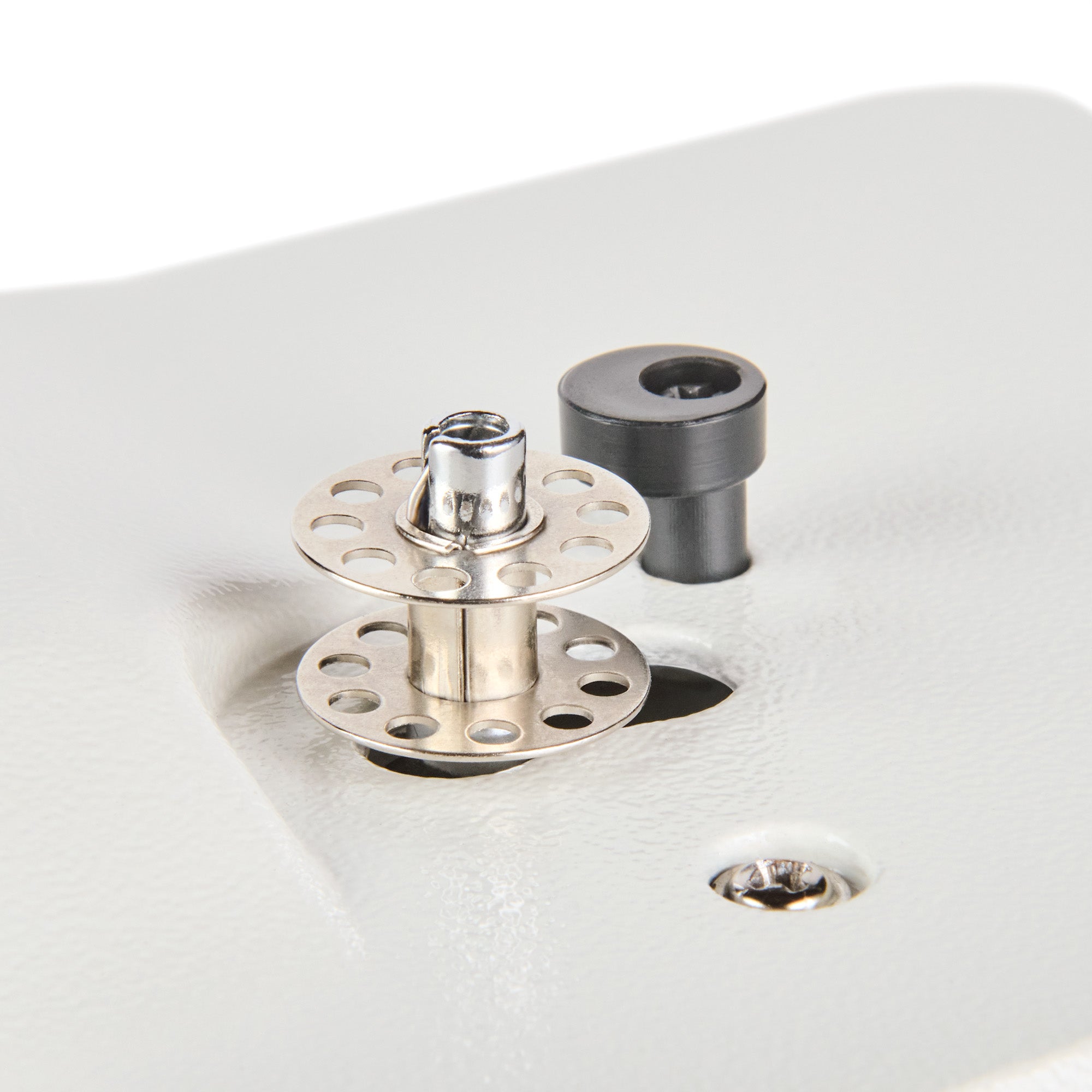 Built-in bobbin winder on a Zig-Zag Stitch Sewing Machine